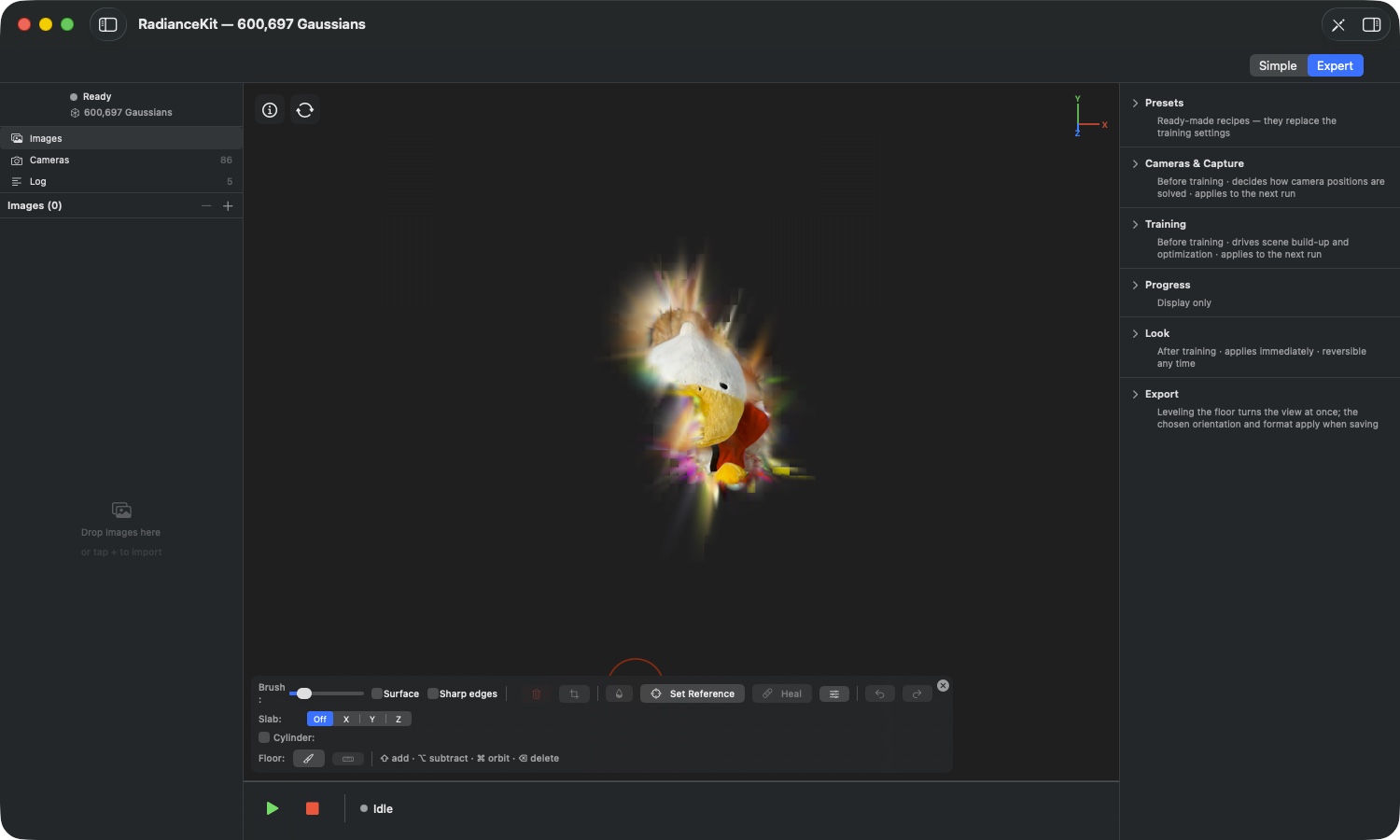 Scene after „Keep Selected Only” — title bar „RadianceKit — 600,697 Gaussians”, the entire background is removed, colorful spikes stand out at the cut surfaces