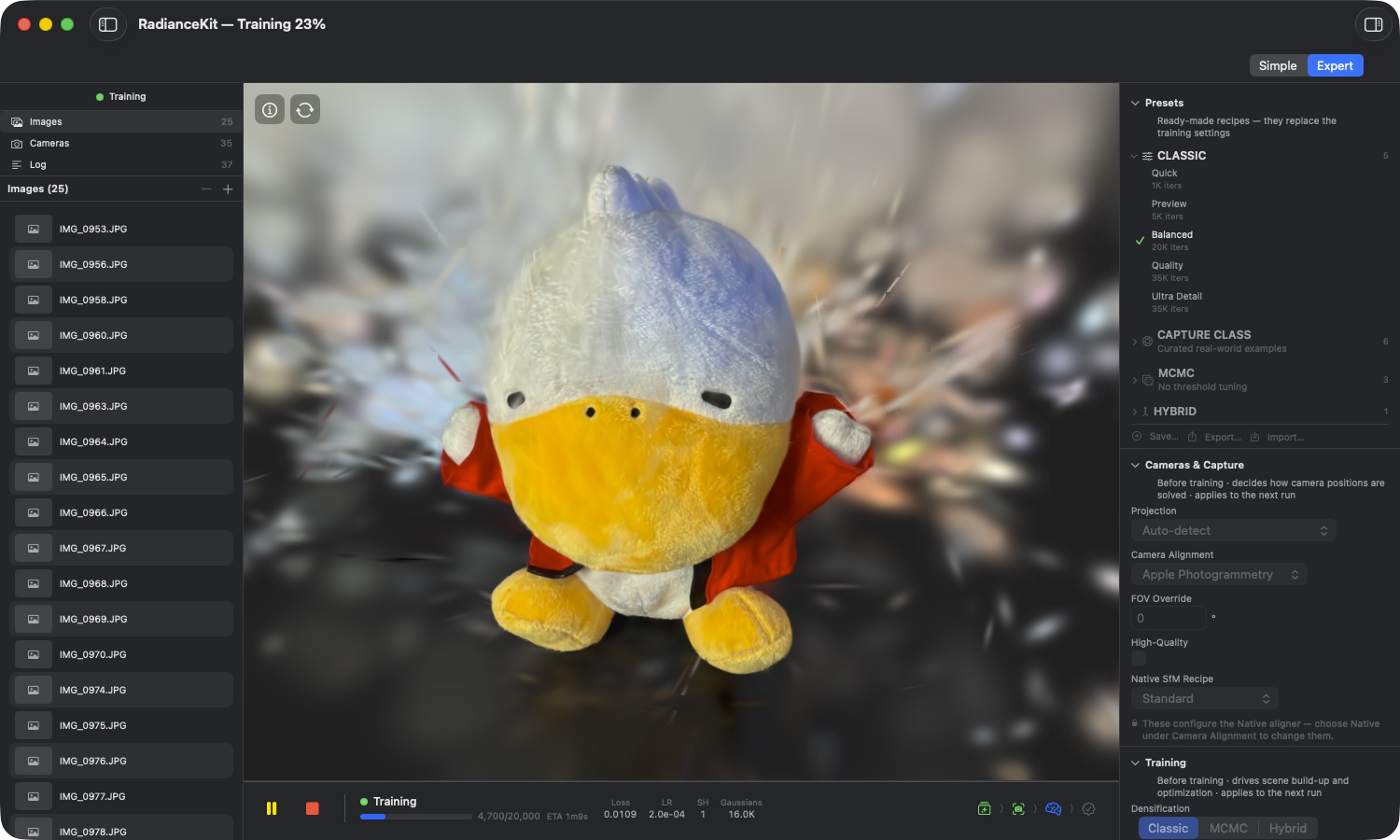 Inspector mid-training — title bar „RadianceKit — Training 23%”, in the viewport the live preview of a fabric duck on a sheepskin, progress 4,700/20,000 with ETA 1m9s, metric bar Loss 0.0109 / LR 2.0e-04 / SH 1 / Gaussians 16.0K, in the Inspector the expanded CLASSIC group with „Balanced 20K iters” marked in green